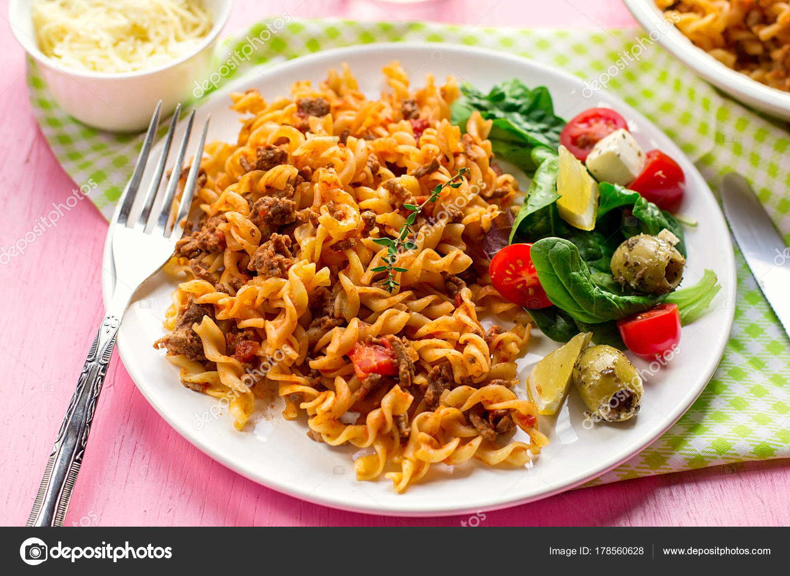 Pasta fusilli with ground beef and tomato sauce Stock Photo by ©larik