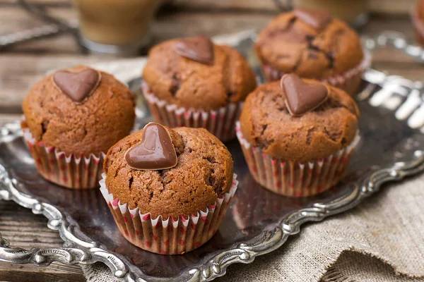 Chocolate muffins with chocolate chips and chocolate heart — Stock Photo, Image