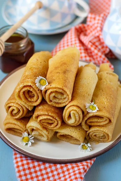Sweet Thin Pancakes Crepes Served Honey Blue Background — Stock Photo, Image