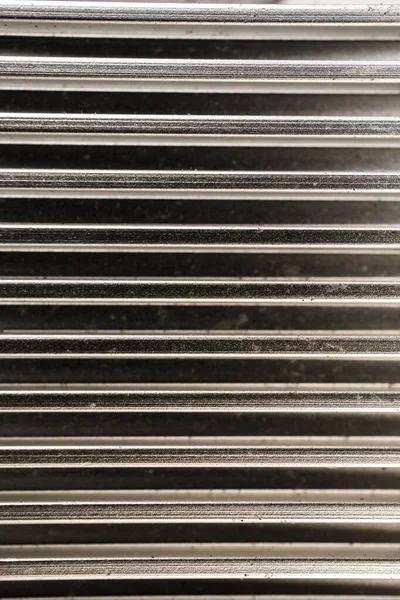 dikey alüminyum kıvrımlı doku parlak dikey metal arkaplan metalik konsept makro yakın çekim