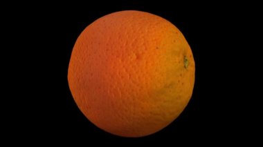 bir dönen 3d render turuncu siyah arka plan üzerine. Video sorunsuz döngü.