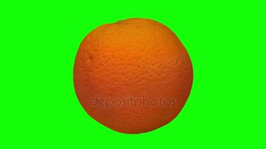 bir dönen 3d render turuncu (için yeşil ekran anahtarlama) yeşil zemin üzerine. Video sorunsuz döngü.