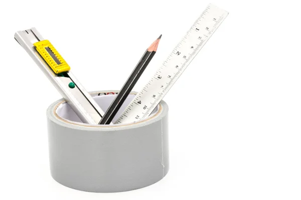 Cinta adhesiva con el lápiz del cortador y la regla en blanco — Foto de Stock
