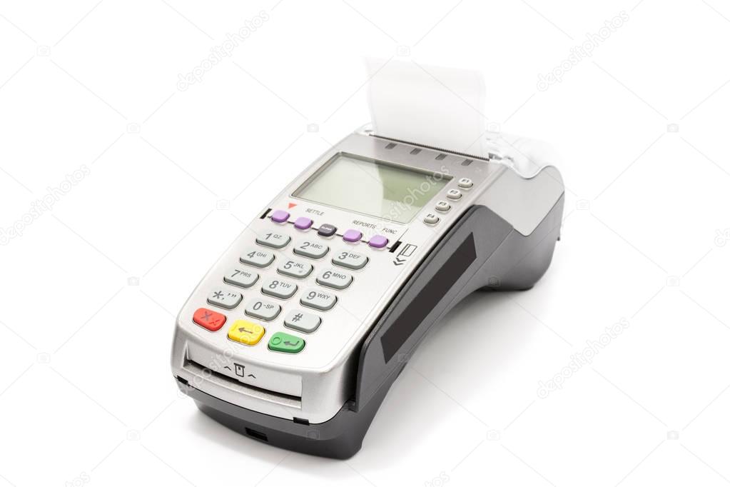 A credit card swipe machine on white