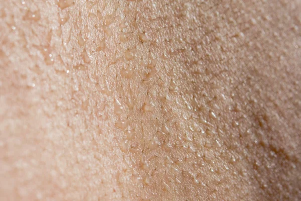 Primer plano de la piel es sudor — Foto de Stock