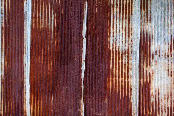 Rusting metal fencing or siding — Stock Photo, Image