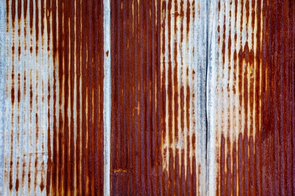 Rusting metal fencing or siding — Stock Photo, Image