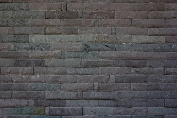doku ve arka plan siyah tuğla duvar.