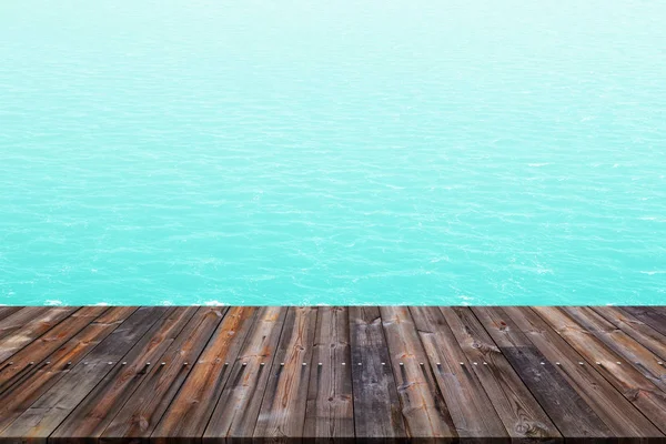 푸른 바다 배경으로 나무 바닥. — 스톡 사진