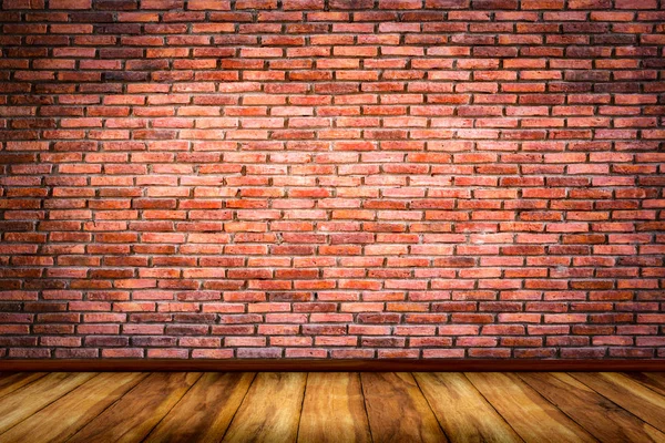 Red bricks wall with wood floor texture background.