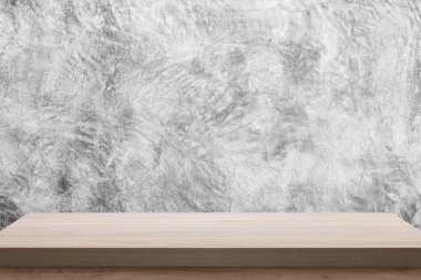 Beton duvar arka plan üzerinde ahşap masa.
