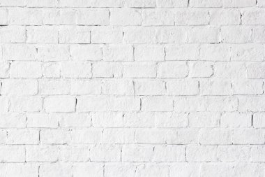 Doku ve arka plan beyaz tuğla duvar.