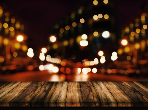 Empty of wood table with abstract urban night light bokeh backgr — Stock Photo, Image