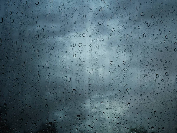 Deszcz kropla wody na oknie szkło tło — Zdjęcie stockowe