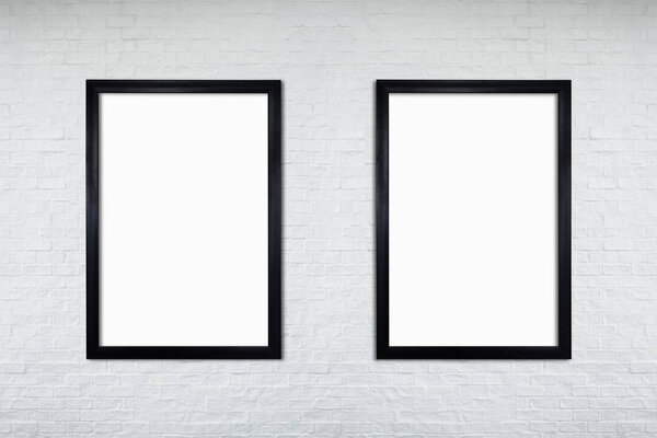 Mock up blank poster picture frame on white brick wall.