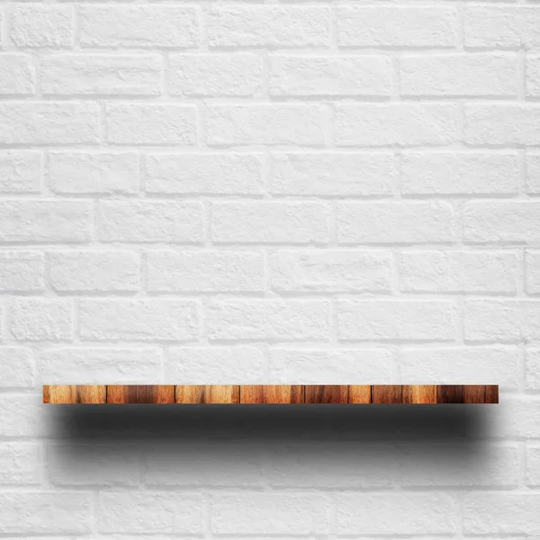 Empty top of wooden shelf with white brick wall. — Stock Photo, Image