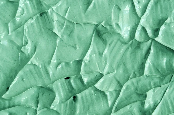 Green cosmetic clay texture close up. Abstract background. — Stock Photo, Image