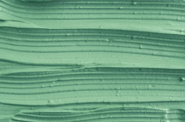 Textura de arcilla cosmética verde de cerca. Fondo abstracto . — Foto de Stock