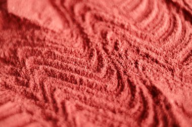 Red moroccan cosmetic clay powder texture close up, selective focus. Abstract background. clipart