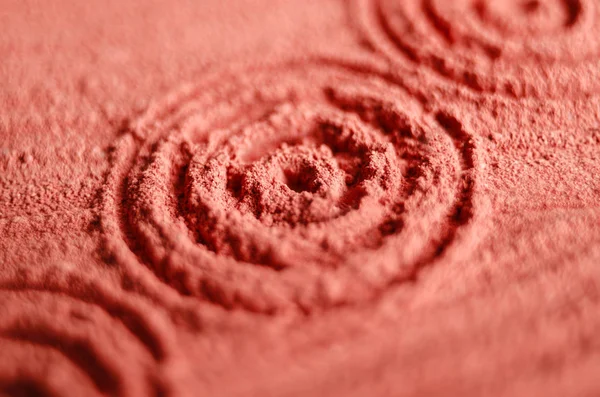 Red moroccan cosmetic clay powder texture close up, selective focus. Abstract background. — Stock Photo, Image