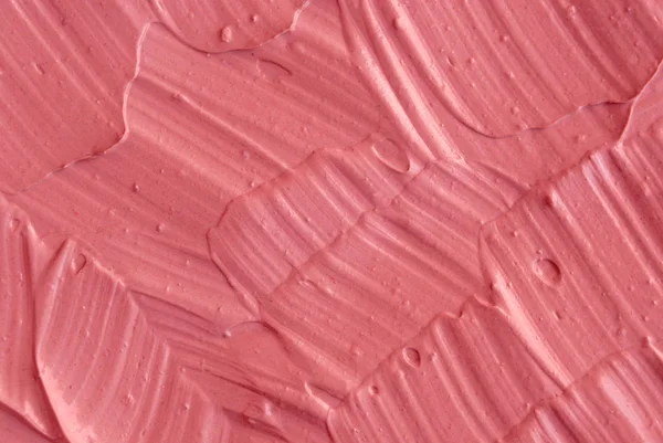 Arcilla cosmética rosa (crema facial, máscara) textura de cerca, enfoque selectivo. Fondo abstracto — Foto de Stock