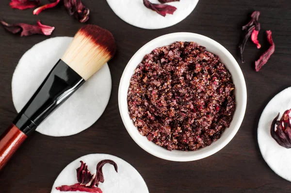 Homemade hibiscus face and body exfoliating  scrub (bath salts, foot soak). Karkade DIY beauty treatment and spa recipe. Top view, copy space — 스톡 사진