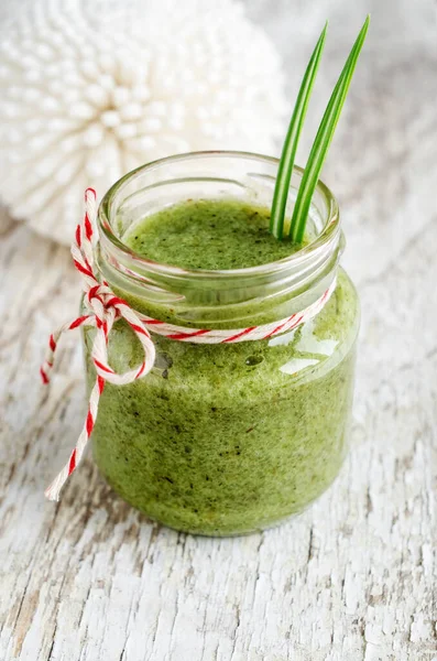 Homemade exfoliating scrub or mask for face and body with herbal extracts (green tea). DIY cosmetics and spa recipe. — Stock Photo, Image