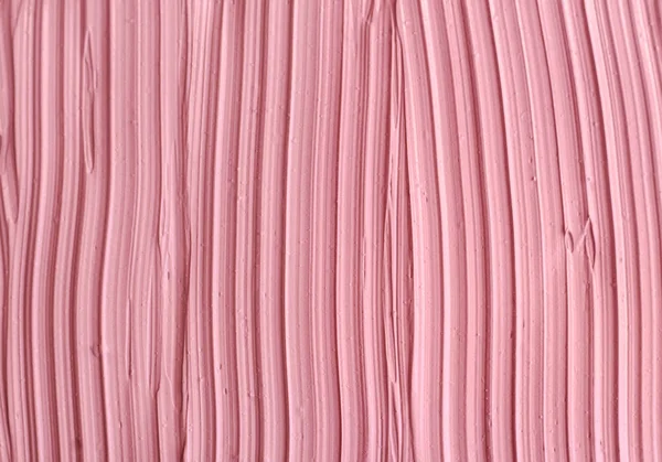 Arcilla cosmética rosa pálido (rhassoul, mascarilla facial, crema facial, envoltura corporal, champú para el cabello) textura de cerca, enfoque selectivo. Fondo abstracto con pinceladas . — Foto de Stock