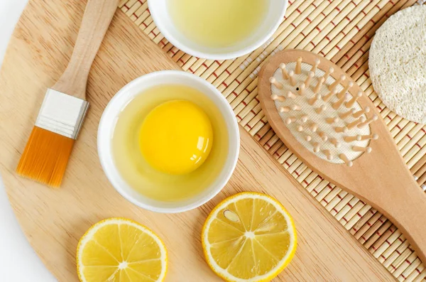 Raw Egg Small White Bowl Lemon Juice Slices Wooden Hair — Stock Photo, Image