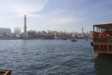 DUBAI, UAE - DECEMBER 26 2017: Dubai Creek withtraditional boats navigating