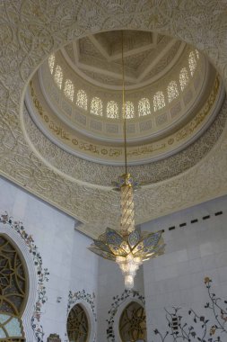 ABU DHABI, UAE - DECEMBER 28 2017: Pendant lamp inside the mosque