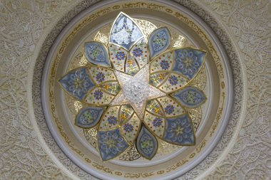 ABU DHABI, UAE - DECEMBER 28 2017: Architectural detail of the pendant lamp of Sheikh al Zayed mosque in Abu Dhabi