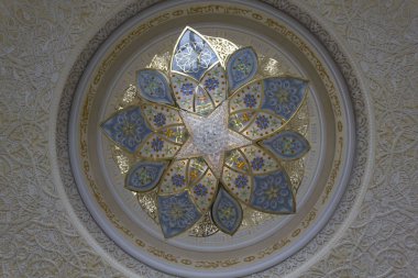 ABU DHABI, UAE - DECEMBER 28 2017: Architectural detail of the pendant lamp of Sheikh al Zayed mosque in Abu Dhabi