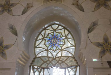 ABU DHABI, UAE - DECEMBER 27 2017: glass window detail inside the mosque