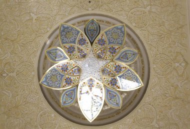 ABU DHABI, UAE - DECEMBER 28 2017: Architectural detail of the pendant lamp of Sheikh al Zayed mosque in Abu Dhabi