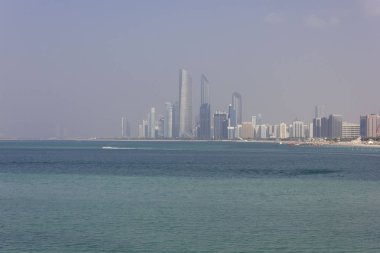 ABU DHABI, UAE - DECEMBER 28 2017: view of Abu Dhabi skyline from its marina