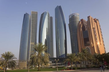 ABU DHABI, UAE - DECEMBER 28 2017: etihad towers modern skyscrapers in Abu Dhabi at sunset light