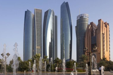 ABU DHABI, UAE - DECEMBER 28 2017: etihad towers modern skyscrapers in Abu Dhabi at sunset light