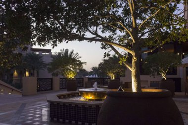 DUBAI, UAE - DECEMBER 29 2017: Sunset view of an intimate square in Madinat Jumerirahsouk in Dubai