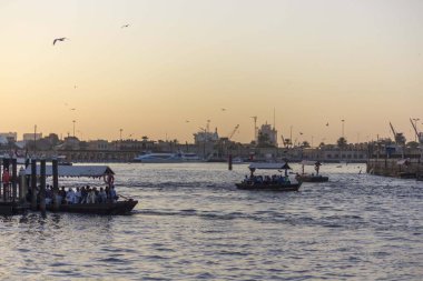 DUBAI, UAE - DECEMBER 30 2017: Dubai creek at sunset time