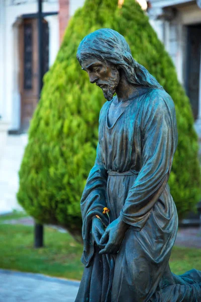 Rysunek smutny Jezusa Chrystusa klęczy, modląc się, jako żeton — Zdjęcie stockowe