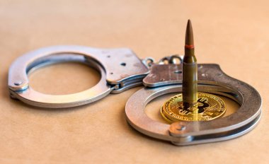 Bitcoins, bir mermi, bir şırınga ve kelepçe şifreli para birimi gizleyebilirsiniz suçları soyut bir sembolü olarak