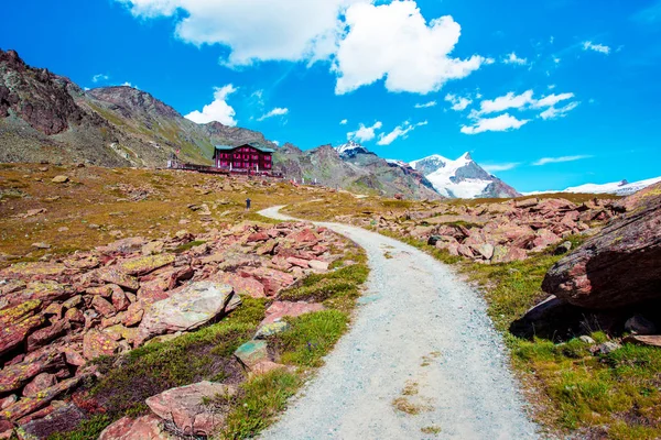 Beautiful magical fairytale landscape with hotel opposite the Matterhorn in the Swiss Alps near Lake Stellisee, near Zermatt, Switzerland.