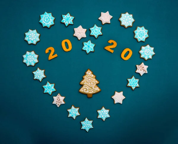 Beautiful New Year background with cookies in the form of Christ — Stock Photo, Image