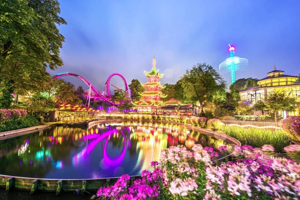 Breathtaking magical landscape in Tivoli Gardens in the evening — Stock Photo, Image