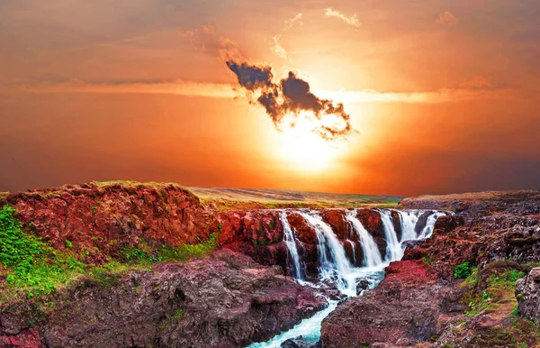 Beautiful mystical landscape with scorpion-shaped cloud over canyon Kolugljufur with water between the rocks in Iceland. Exotic countries. Amazing places.