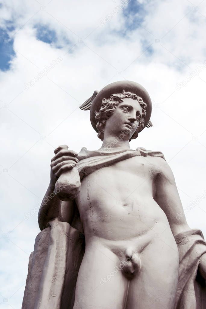 fragment of ancient statue of god Hermes (Mercury), personificat