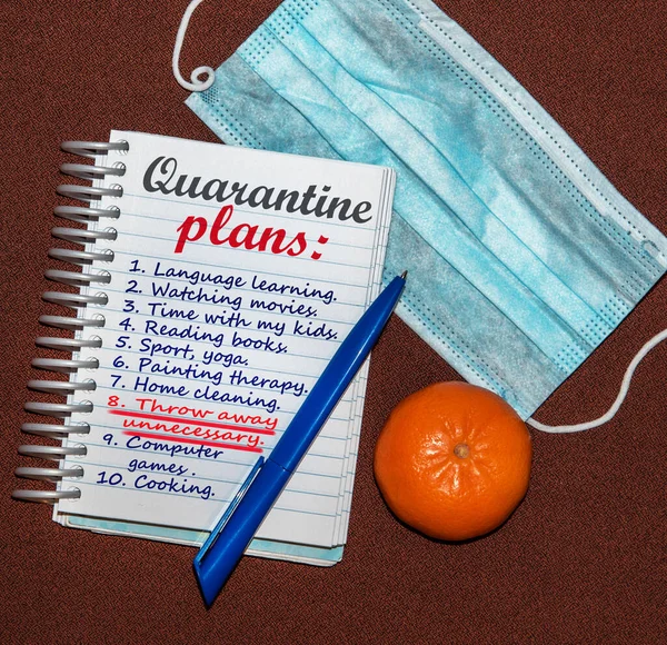An abstract image of a notebook with plans for what to do while a coronavirus quarantin. Emphasis on throw away unnecessary as the best way to spend your free time.