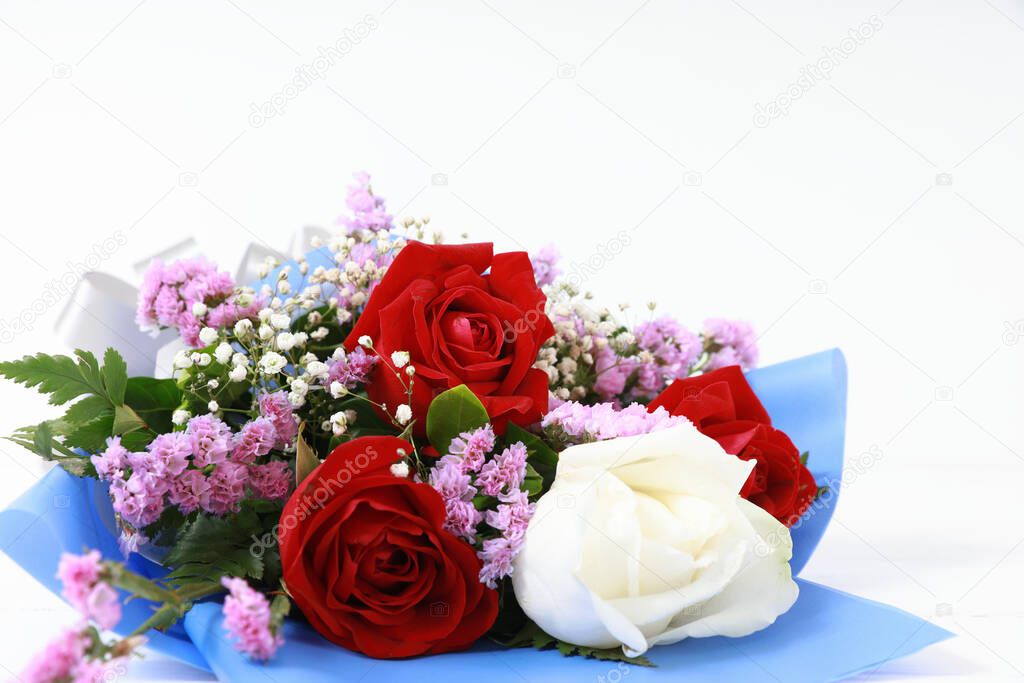 Close up bouquet of roses on white wood. With copy space, concept valentine day.