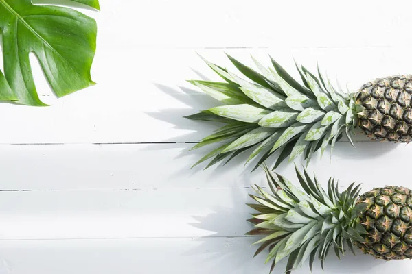 Pineapples Monstera Leaves White Background Copy Space — Stock Photo, Image